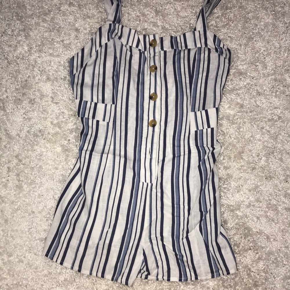 adorable striped romper! 🌊